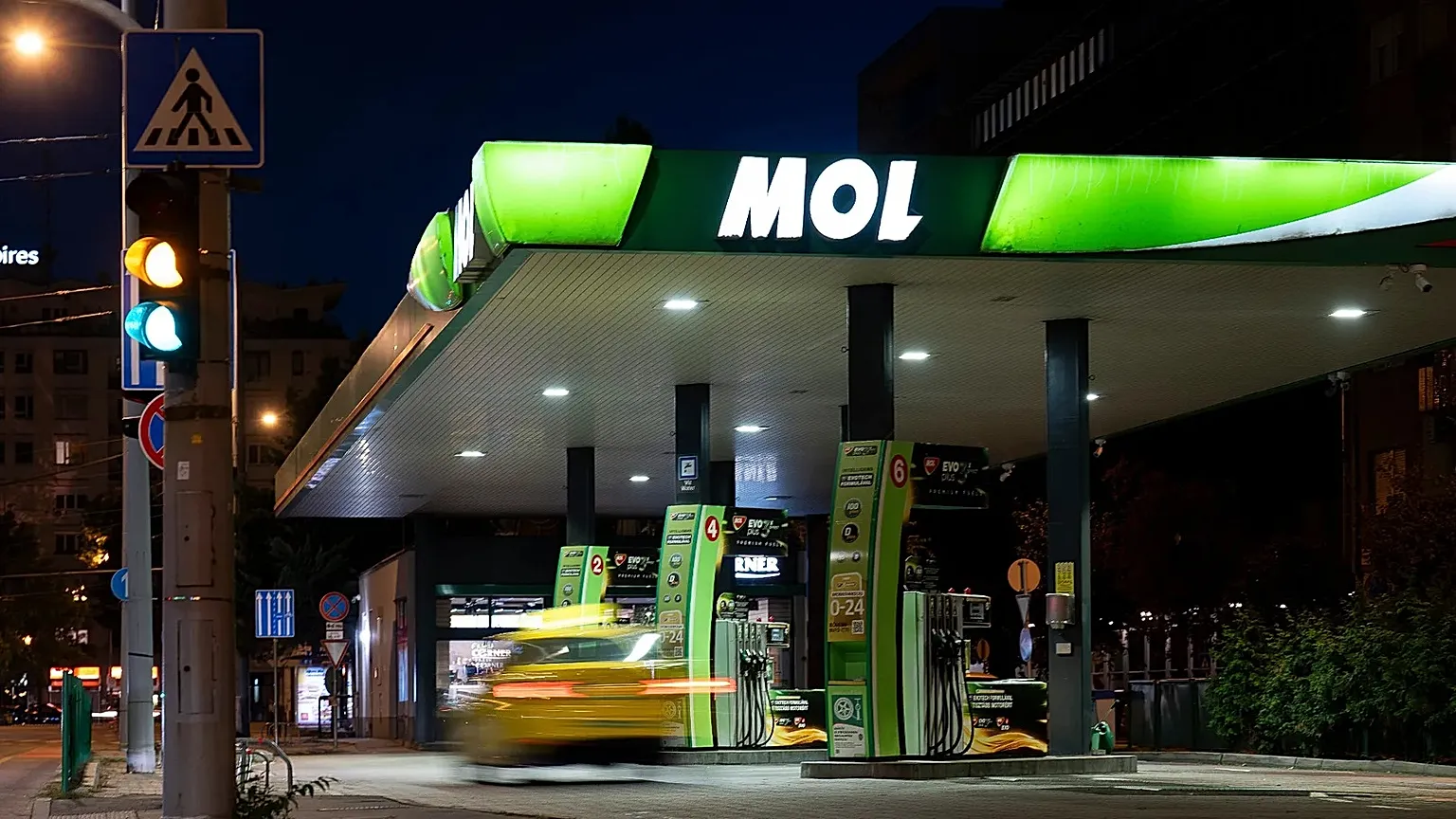 A taxi enters a MOL gas station in downtown Budapest, 27 September, 2025