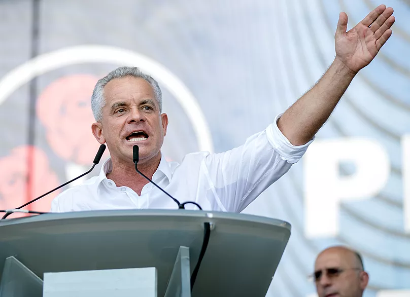 Vladimir Plahotniuc gestures as he addresses a rally in Chișinău, 9 June, 2019
