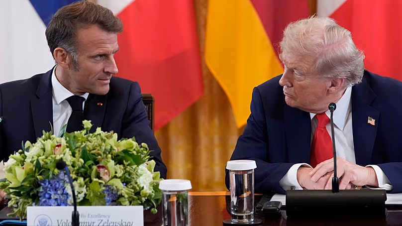 French President Emmanuel Macron speaking with US President Donald Trump at the White House in Washington on 18 August, 2025.