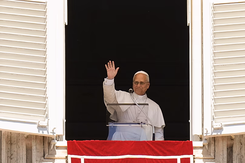 Pope Leo XIV appears at the window of his studio overlooking St. Peter's Square at the Vatican, 26 April, 2026