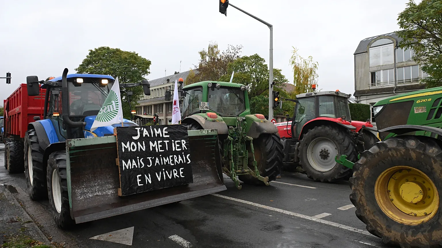 Farmers drive their tractors during a rally against the EU-Mercosur trade agreement on Monday 18 November 2024 in Beauvais, northern France.