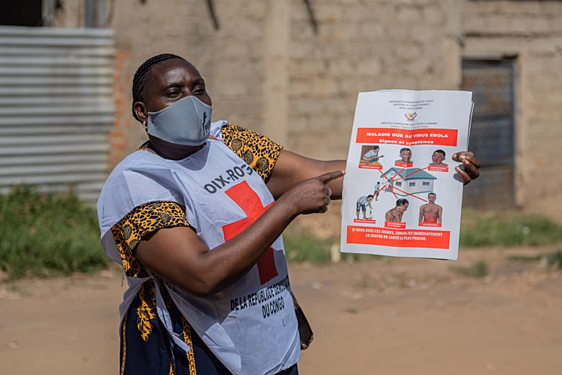 A Red Cross volunteer on a house-to-house sensitisation campaign amid the Ebola outbreak in Bunia, 25 May, 2026