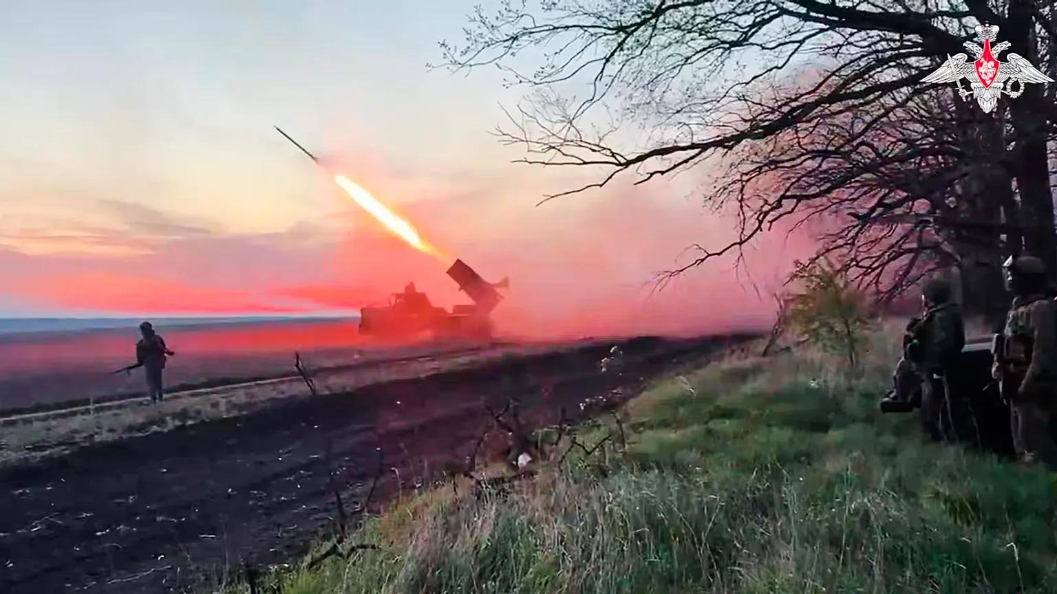 A Russian self-propelled multiple rocket launcher fires towards Ukrainian positions on an undisclosed location in Ukraine.