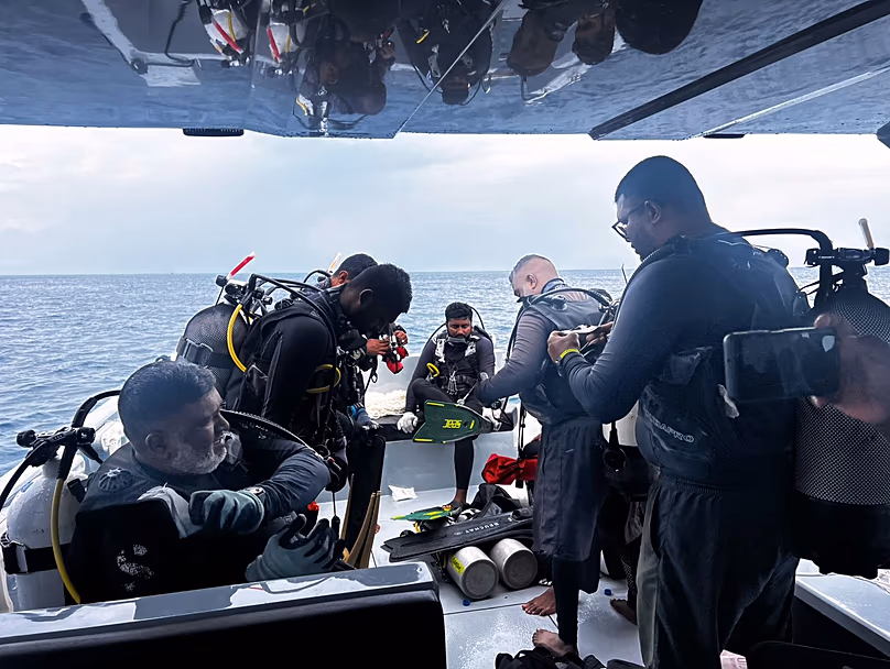 Divers preparing to search for the four missing Italian divers near Alimathaa Island, 15 May, 2026