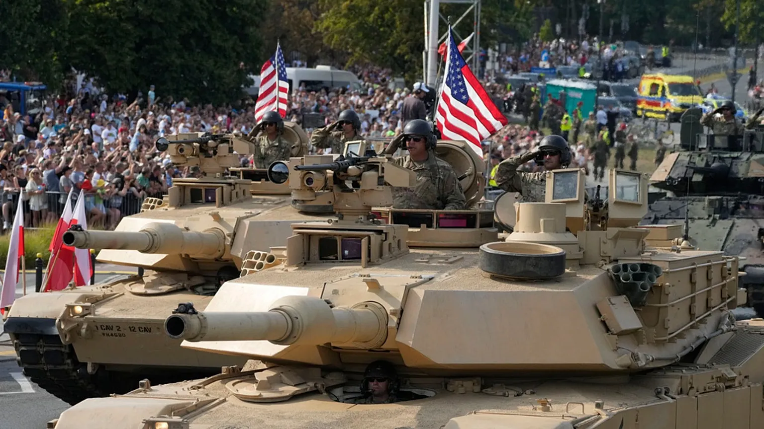 FILE - US troops from NATO member Poland and allies showcase military equipment during the yearly observances on Poland's armed forces holiday in Warsaw, 15 August 2024