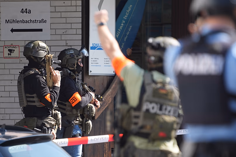 Police officers at the scene of an incident where a hostage situation has occurred at a bank branch in Sinzig, 8 May, 2026