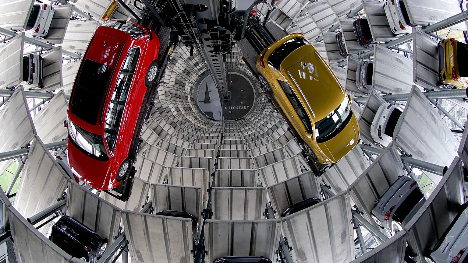 Due to a chip shortage a significant smaller number of new cars are ready for handing over inside one of in total two 'car towers' at the Volkswagen car factory in Germany.