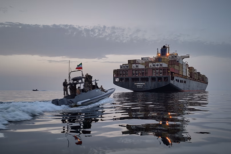 An IRGC speedboat approaches the cargo ship Epaminondas in the Strait of Hormuz, 21 April 2026