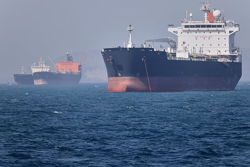 Oil tankers sit at anchor offshore in the Strait of Hormuz off Bandar Abbas, 2 May, 2026
