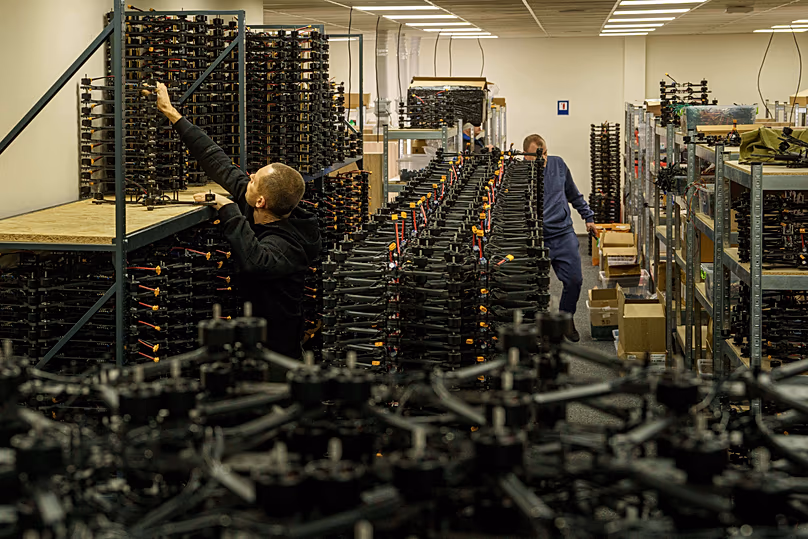 An engineer collects FPV drones of "General Cherry" company at the workshop in Ukraine, on Dec. 4, 2025.