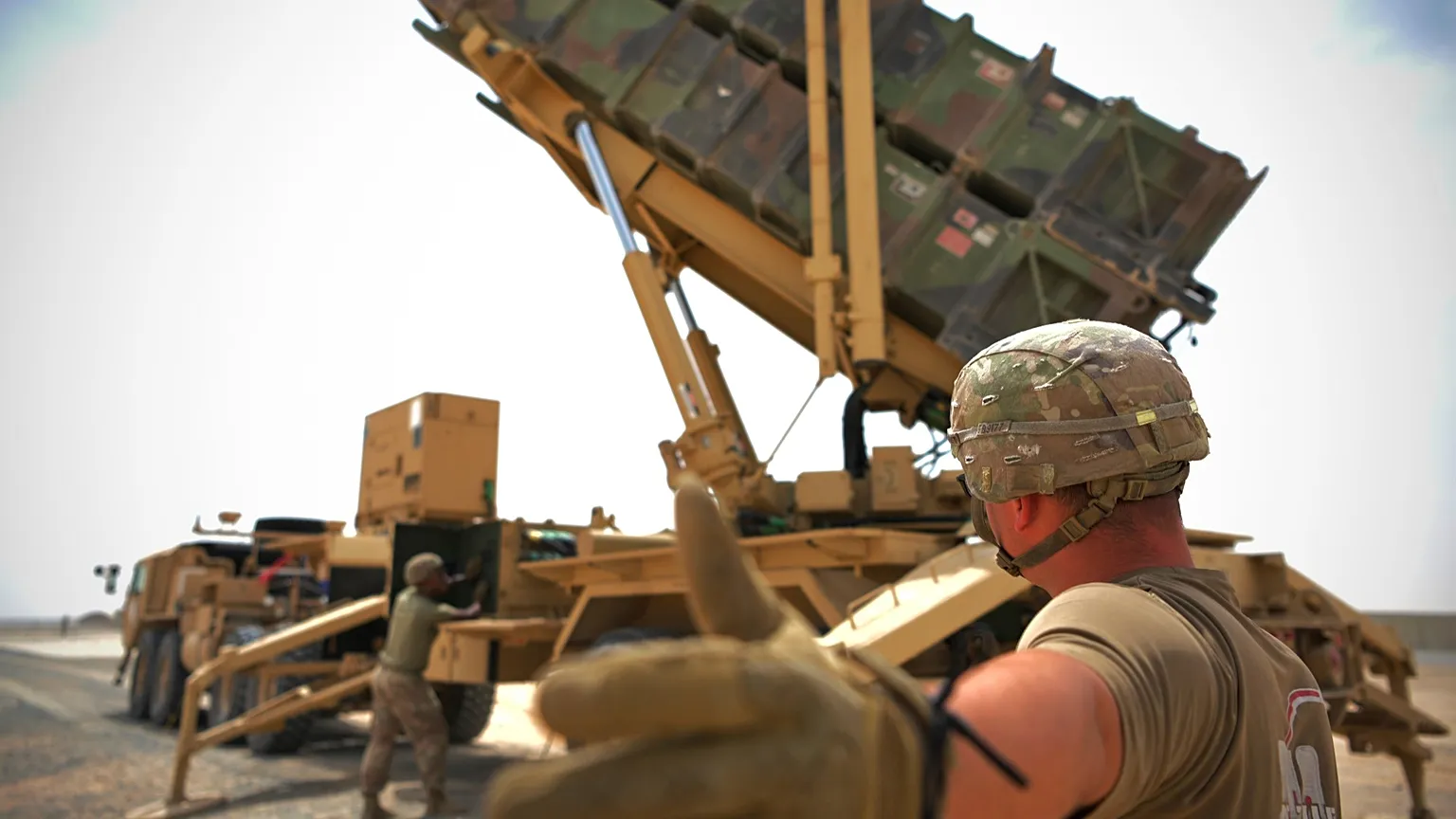 US military personnel at work near a Patriot missile battery at Al-Dhafra Air Base in Abu Dhabi, United Arab Emirates.