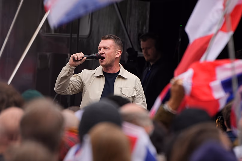 Far-right agitator Stephen Yaxley-Lennon, known by his pseudonym Tommy Robinson speaks during an Unite the Kingdom rally in London, Saturday, May 16, 2026.