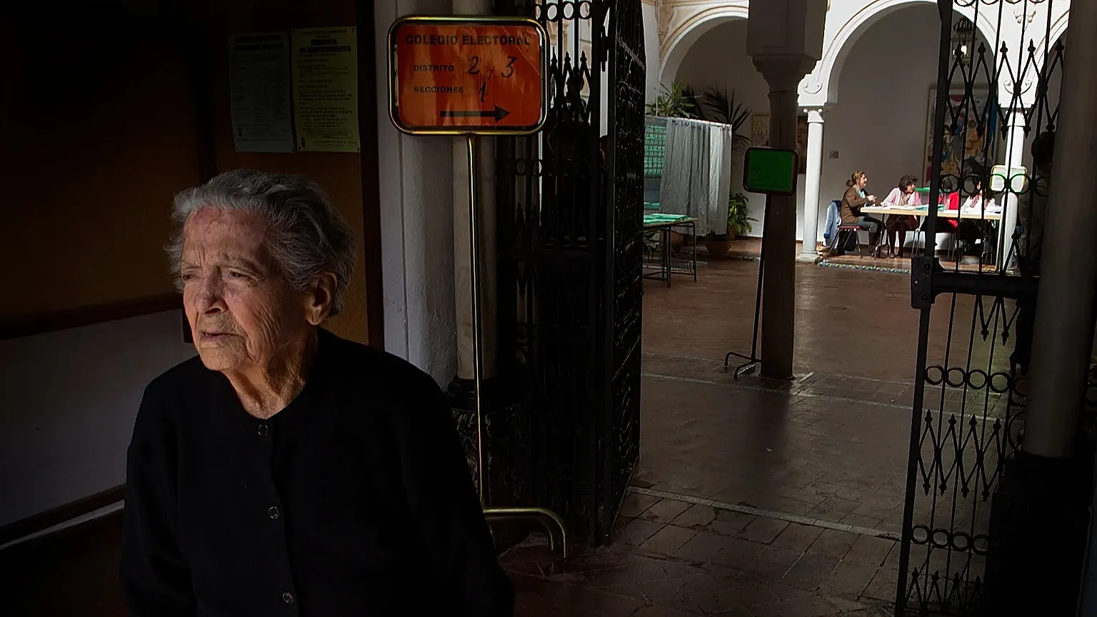 FILE: An elderly voter leaves a polling station after casting her ballot in Carmona, Seville, Spain, on 25 March 2012.