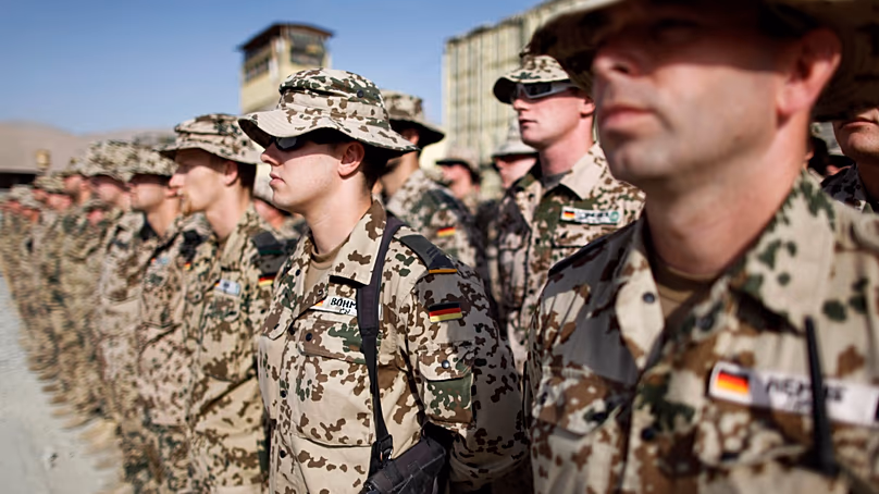 ARCHIVE - German ISAF soldiers line up at their camp in Feysabad, east of Kunduz, Afghanistan, on September 19, 2009