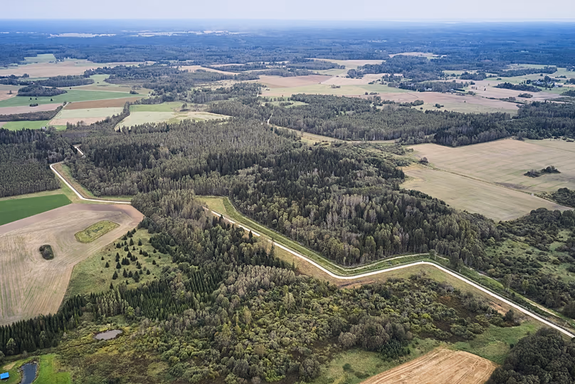A drone shows an aerial view of the Estonia-Russia border near Vinski, 15 September, 2025
