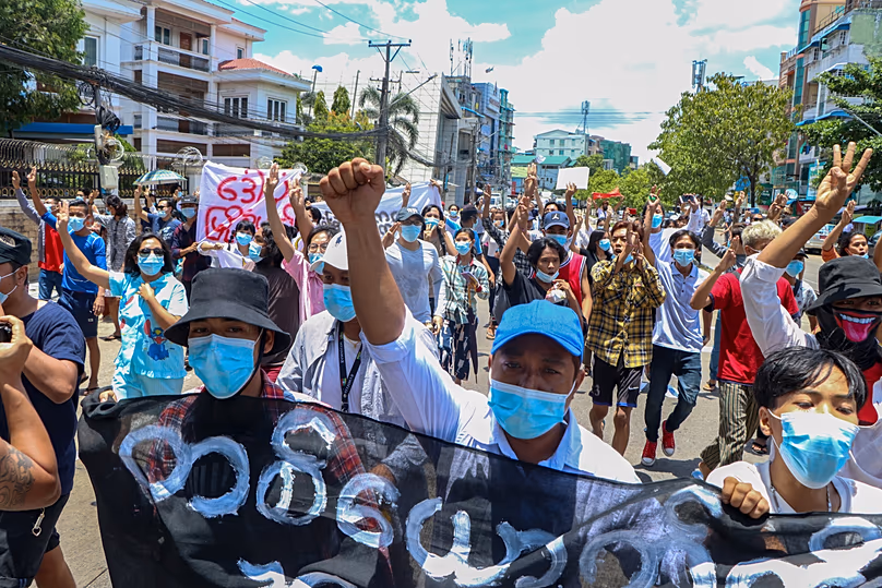 Anti-coup protesters stage a rally in Yangon, 12 May, 2021 