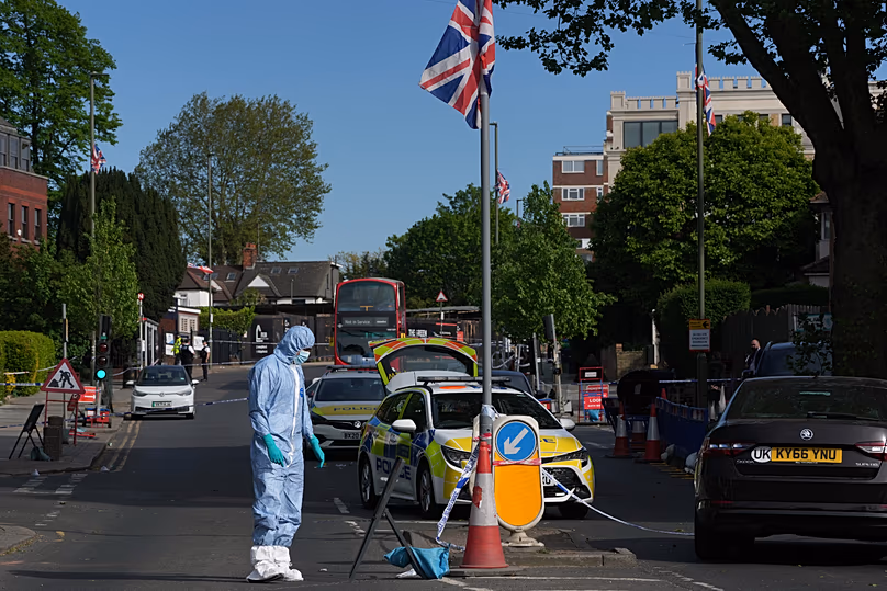 Forensic officers search the area after two people were stabbed in Golders Green, 29 April, 2026