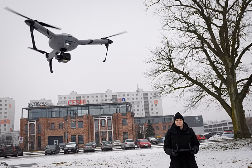 An employee of the drone manufacturer Atlas Aerospace Dmitry Belus tests a drone in the capital Riga, Latvia, 1 February, 2023. 