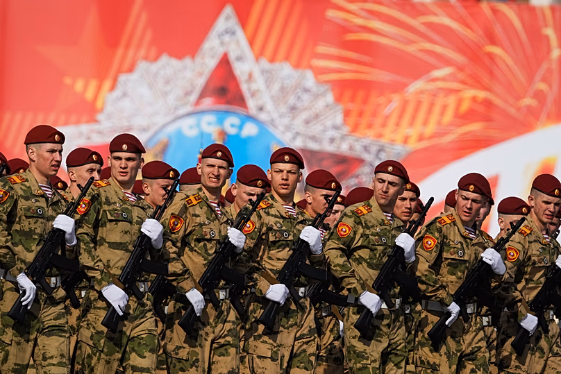 Troops march during a rehearsal for the Victory Day military parade at the Dvortsovaya Square in St. Petersburg, 5 May, 2026