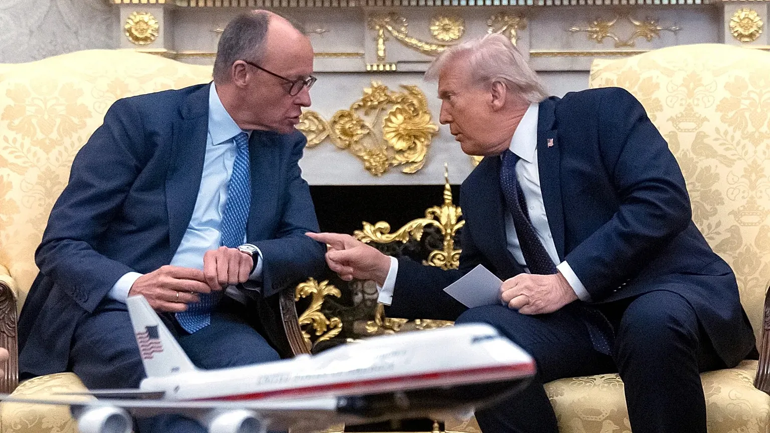 US President Donald Trump talks with German Chancellor Friedrich Merz in the Oval Office at the White House, 3 March, 2026