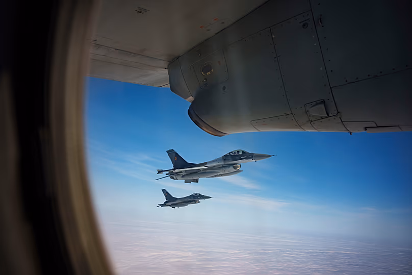 Romanian Air Force F-16 military fighter jets escort a C-27J Spartan aircraft during a NATO Air Policing exercise above eastern Romania, on 6 March, 2024. 