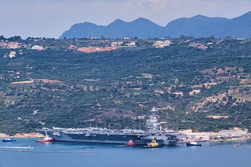 The USS Gerald R. Ford aircraft carrier is docked at Souda Naval Base near Chania on the island of Crete, Monday, March 23, 2026.