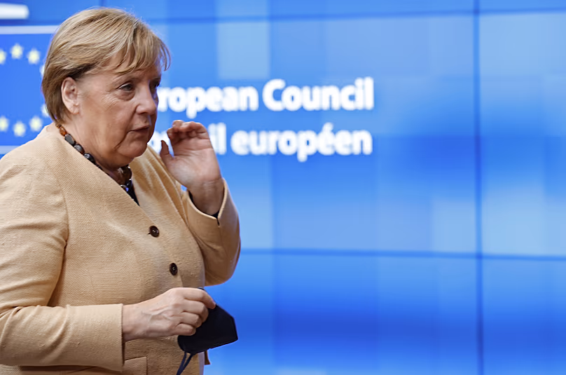 German Chancellor Angela Merkel arrives for an EU summit at the European Council building in Brussels. (AP Photo/Olivier Matthys, Pool)