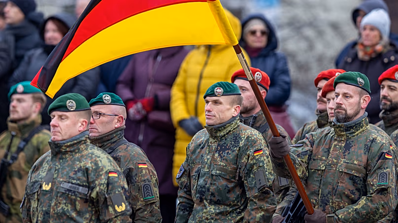 Soldiers attend a ceremony marking the 106th anniversary of the Lithuanian military, on Armed Forces Day in Vilnius, Lithuania, Nov. 23, 2024.