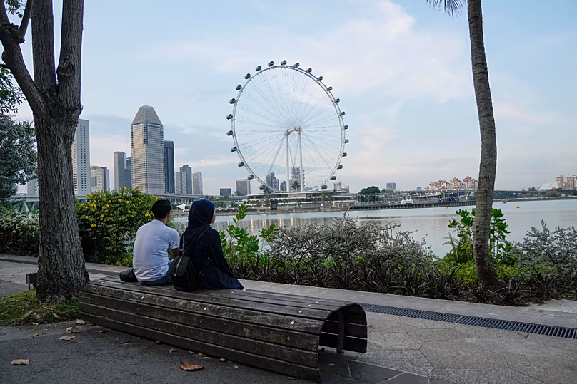 A couple enjoy the Singapore Marina bay skyline, 11 September, 2024