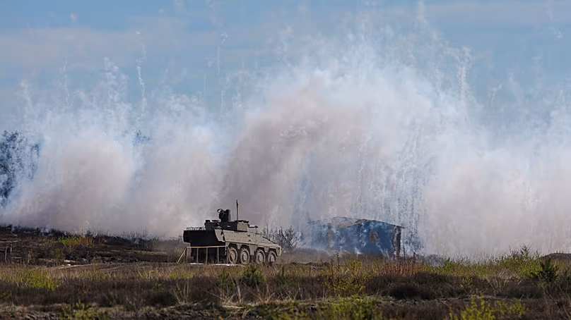 Bundeswehr troops demonstrate their capabilities during a visit of German Chancellor Friedrich Merz at the Bundeswehr base in Munster, Germany, Thursday, April, 30, 2026