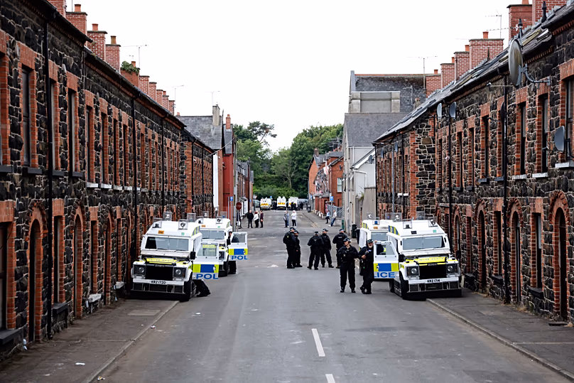 PSNI officers on an empty street in Ballymena, 11 June, 2025