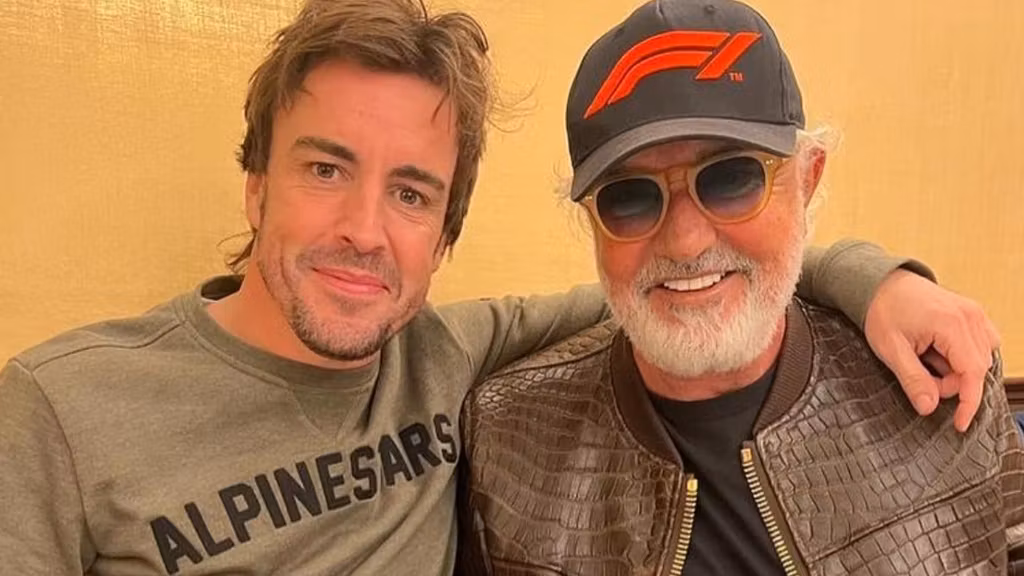 Fernando Alonso, junto a Flavio Briatore.