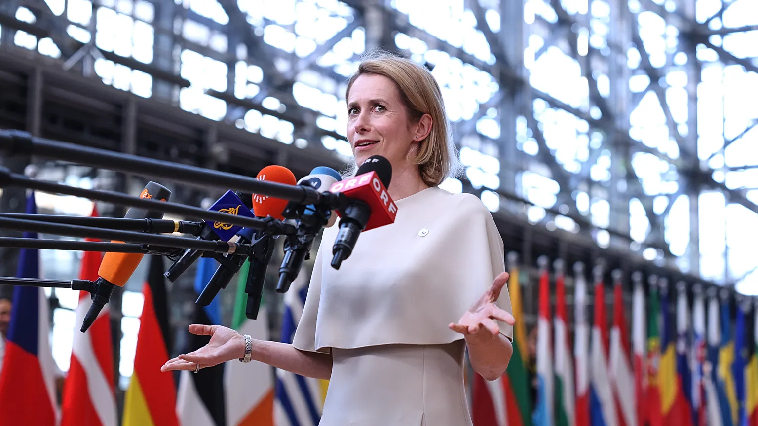 European Union foreign policy chief Kaja Kallas talks to journalists as she arrives for the EU summit in Brussels, Thursday, June 18, 2026. 