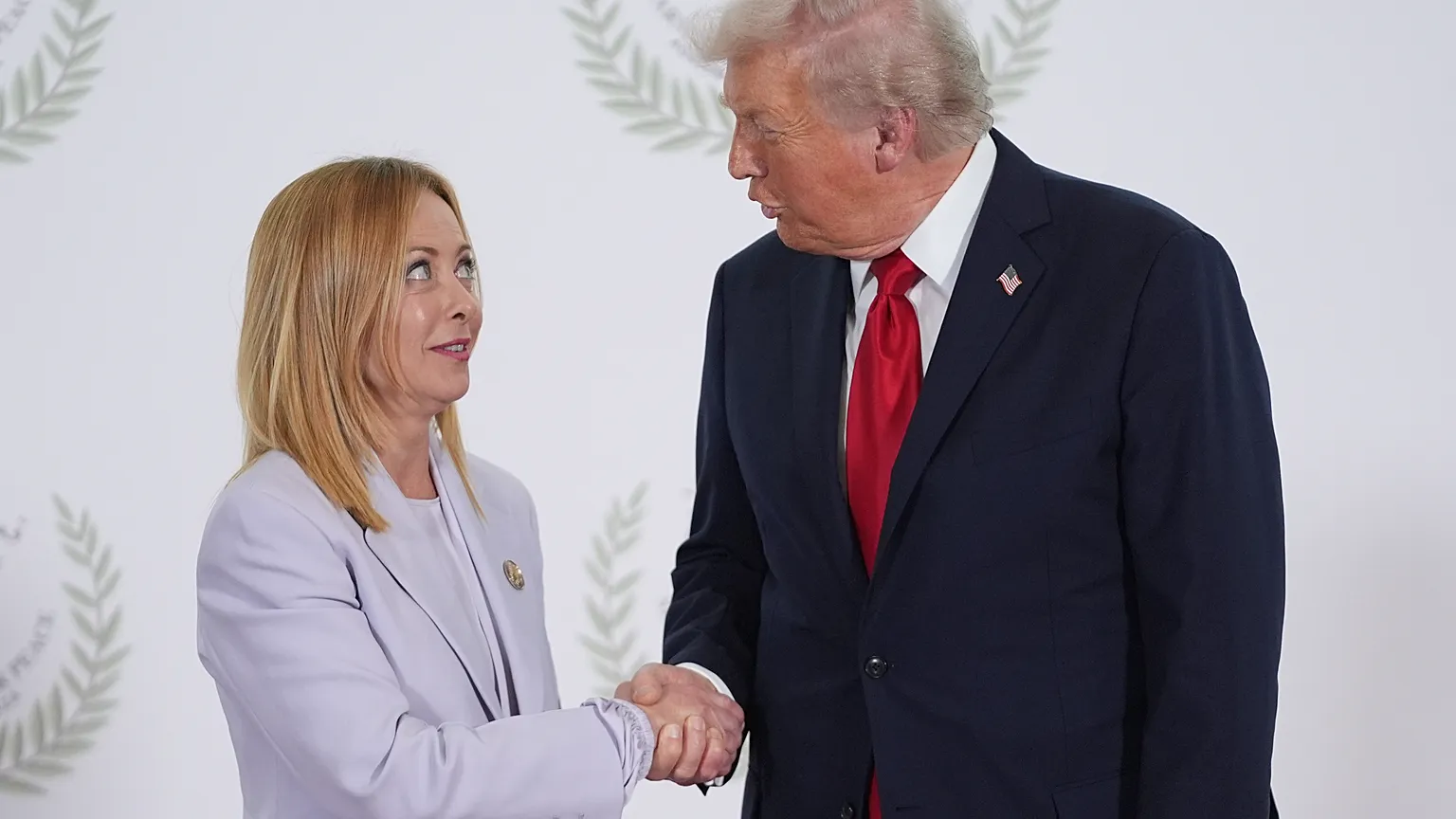President Donald Trump greets Italy's Prime Minister Giorgia Meloni during summit after breakthrough ceasefire deal in Israel-Hamas war, Monday, Oct. 13, 2025.