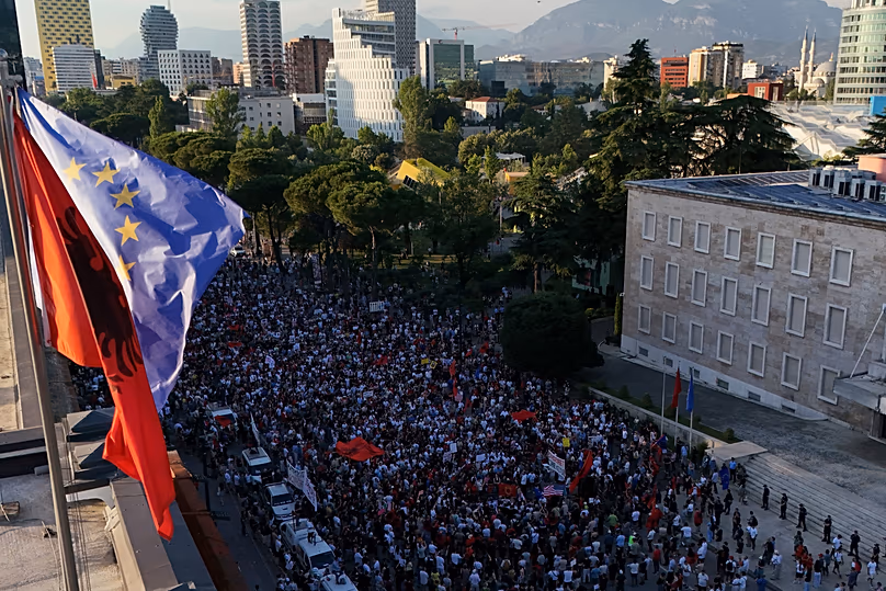 Protesters take part in a rally in Tirana, Albania, Tuesday, June 9, 2026, against the construction of a massive coastal development project.