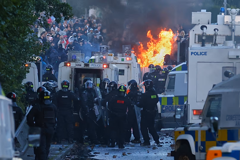 Police attempt to clear protesters near Newtownabbey following a stabbing incident, 10 June, 2026
