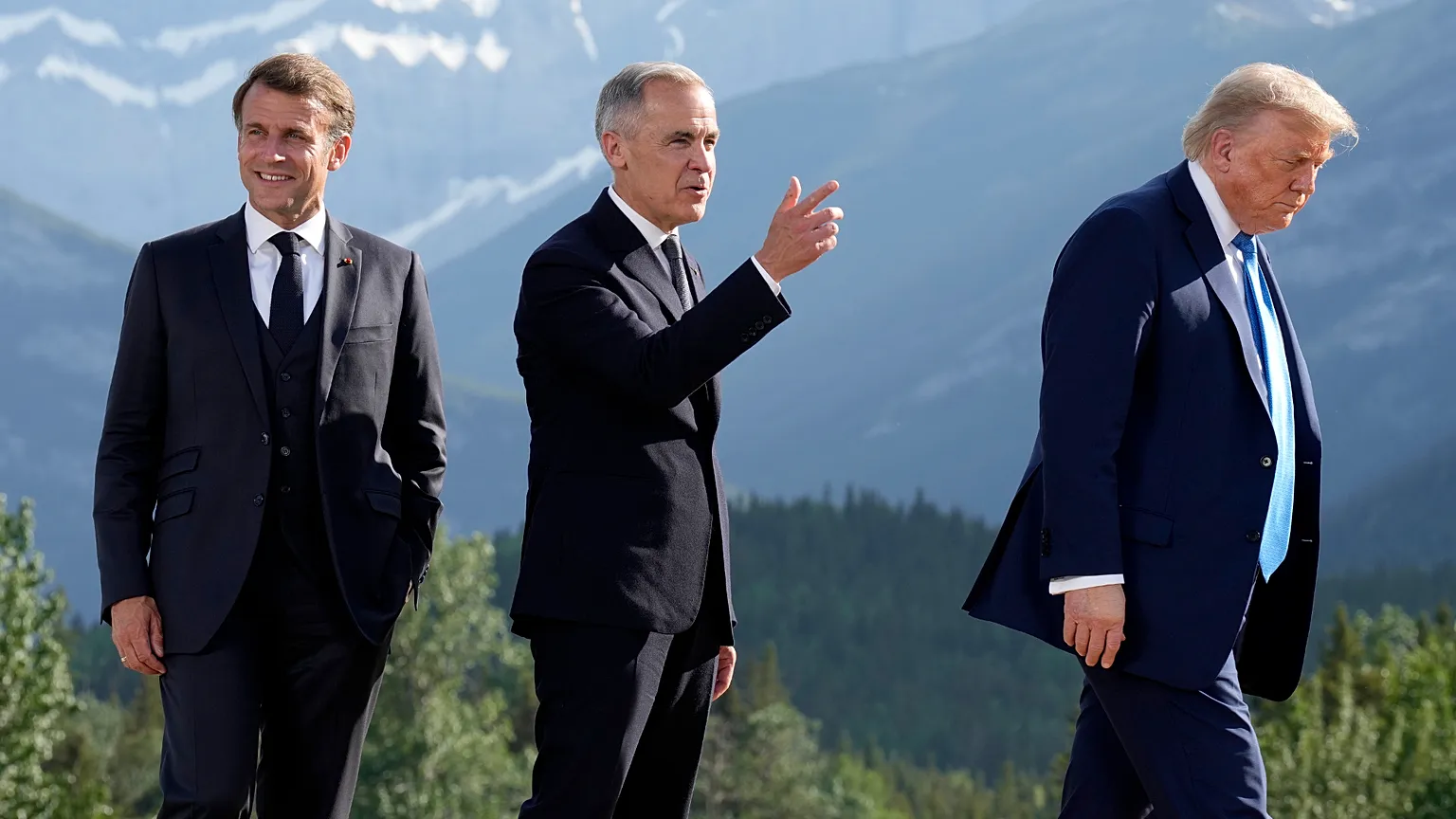 Macron, Carney and Trump at last year's G7 in Kananaskis, Canada — the three leaders return to Évian with relations significantly more strained.