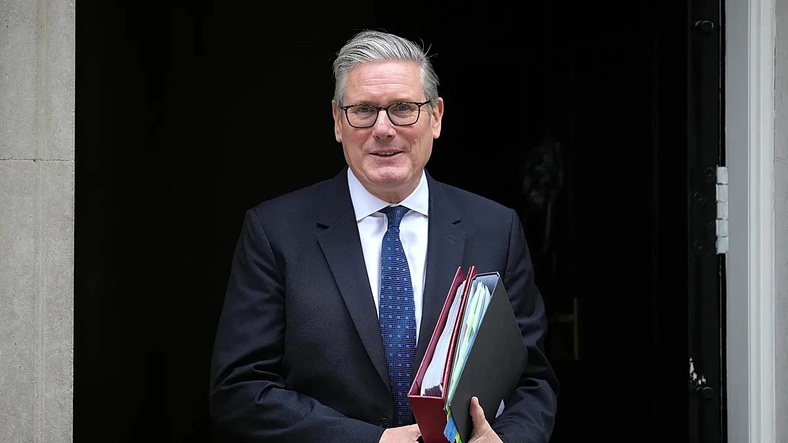 Britain's Prime Minister Keir Starmer leaves 10 Downing Street to attend the weekly session of Prime Minister's Questions in parliament in London, Wednesday, 10 June 2026.