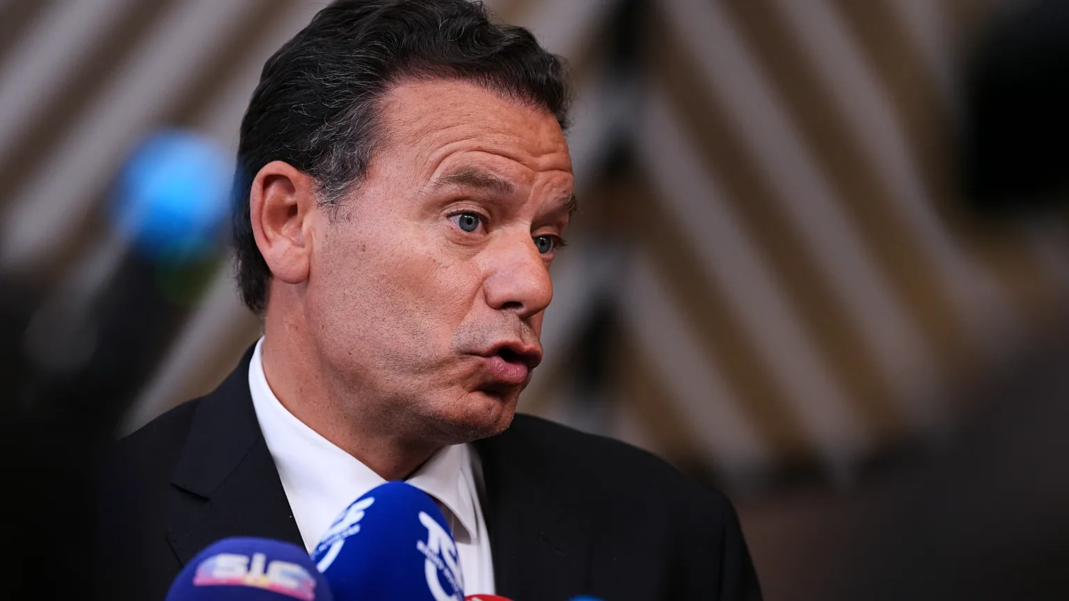 Portugal’s prime minister Luís Montenegro speaks to reporters on arrival at the EU summit in Brussels, Thursday, 18 June 2026