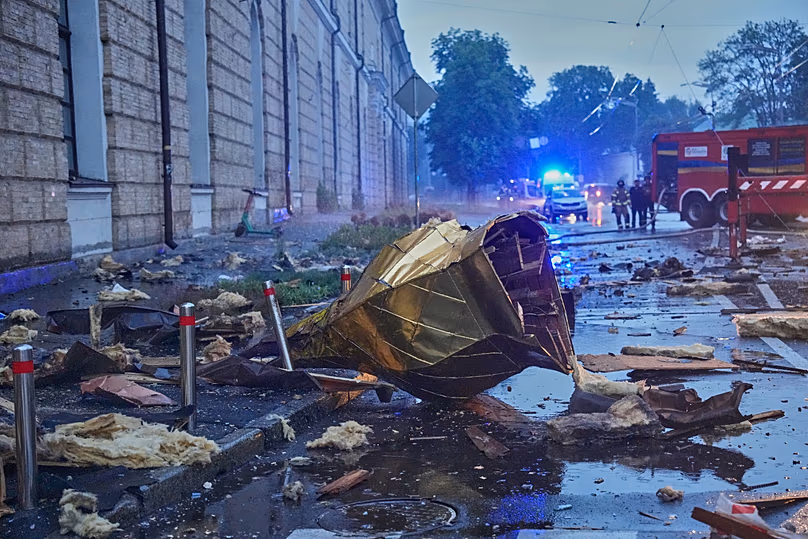 A golden cupola from one of the churches of the damaged Kyiv-Pechersk Lavra lies on the ground in Kyiv, 15 June, 2026
