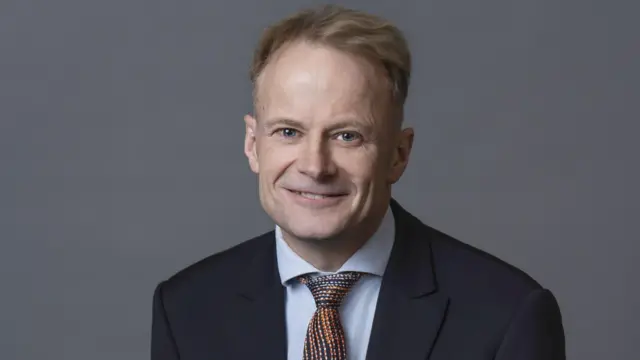 Richard Scolyer sonriendo a la cámara