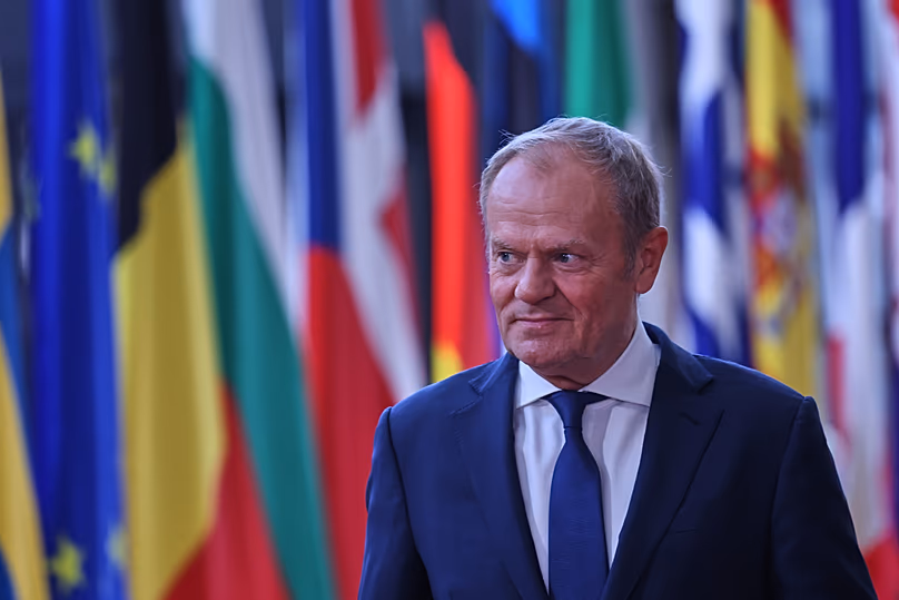Poland's Prime Minister Donald Tusk arrives for the EU summit in Brussels, Thursday, June 18, 2026. 