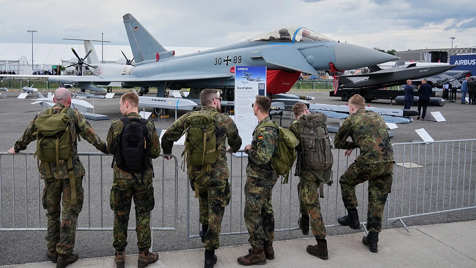 Military personnel visit the International Aerospace Exhibition (ILA ) at the airport fairground in Berlin, Germany, Wednesday, June 10, 2026