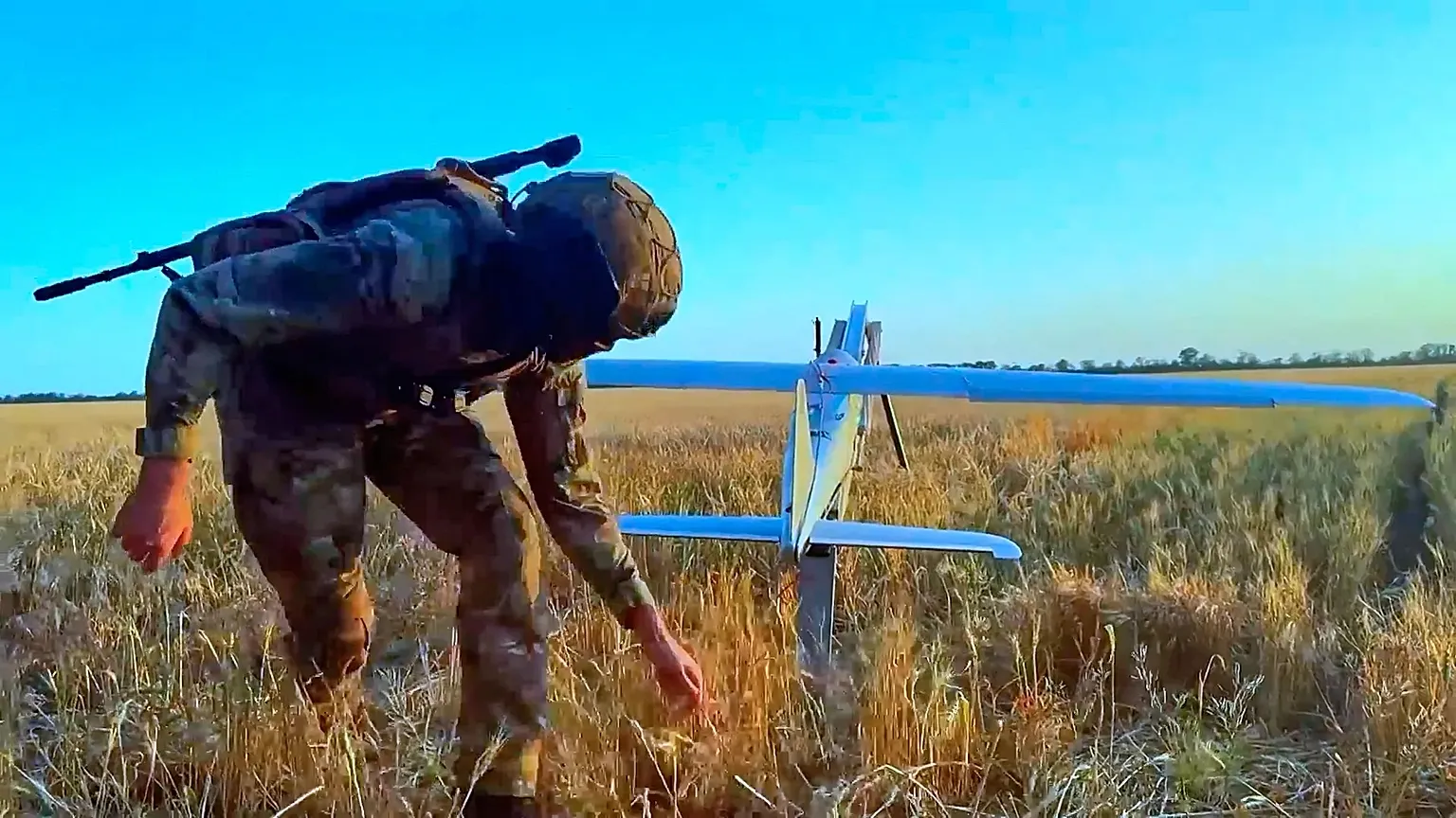 A Russian serviceman launches a drone in an undisclosed location in Ukraine, 27 May, 2026 