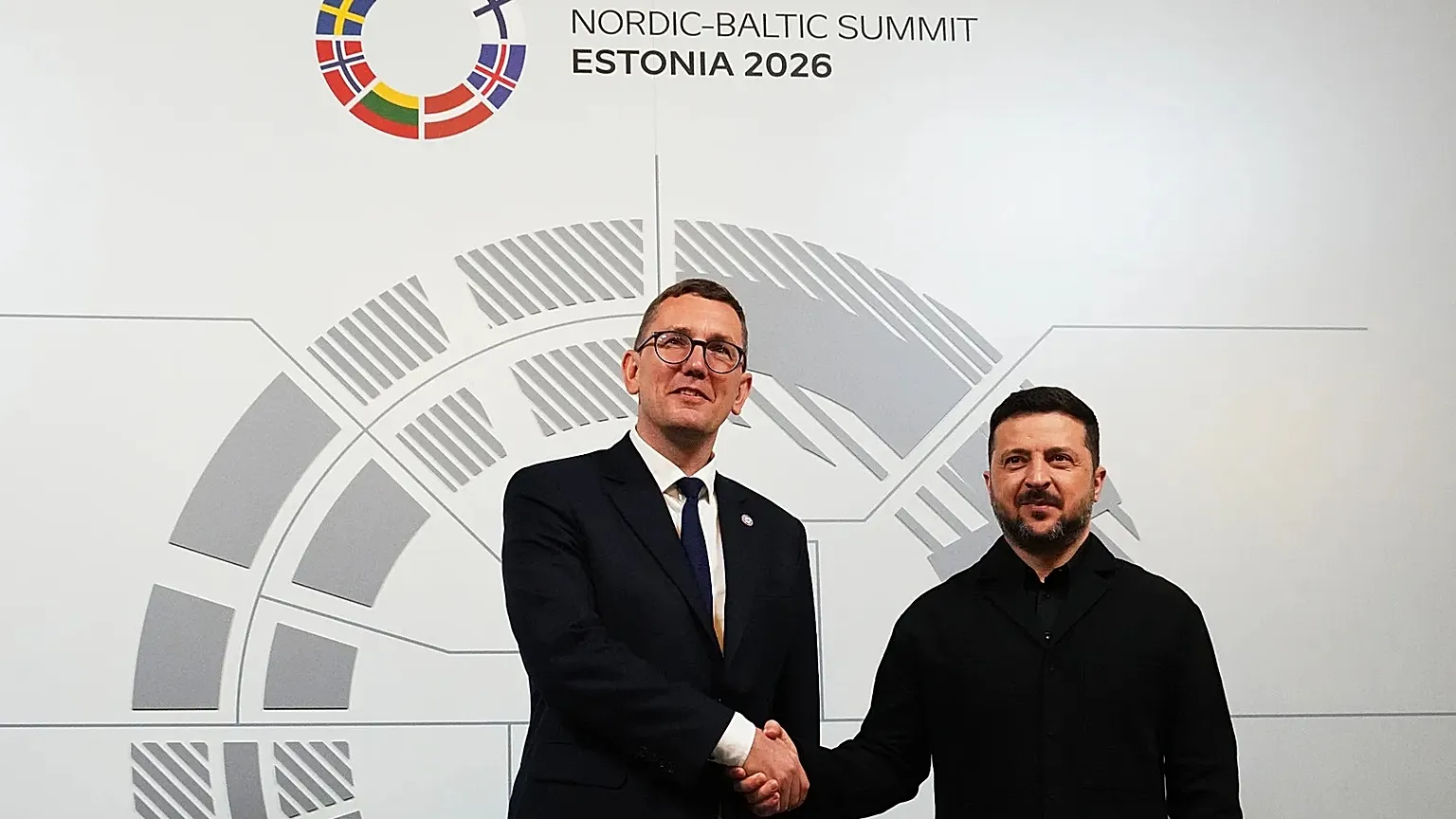 Estonia's Prime Minister Kristen Michal and Ukraine's President Volodymyr Zelenskyy shake hands in Tallinn, 9 June, 2026