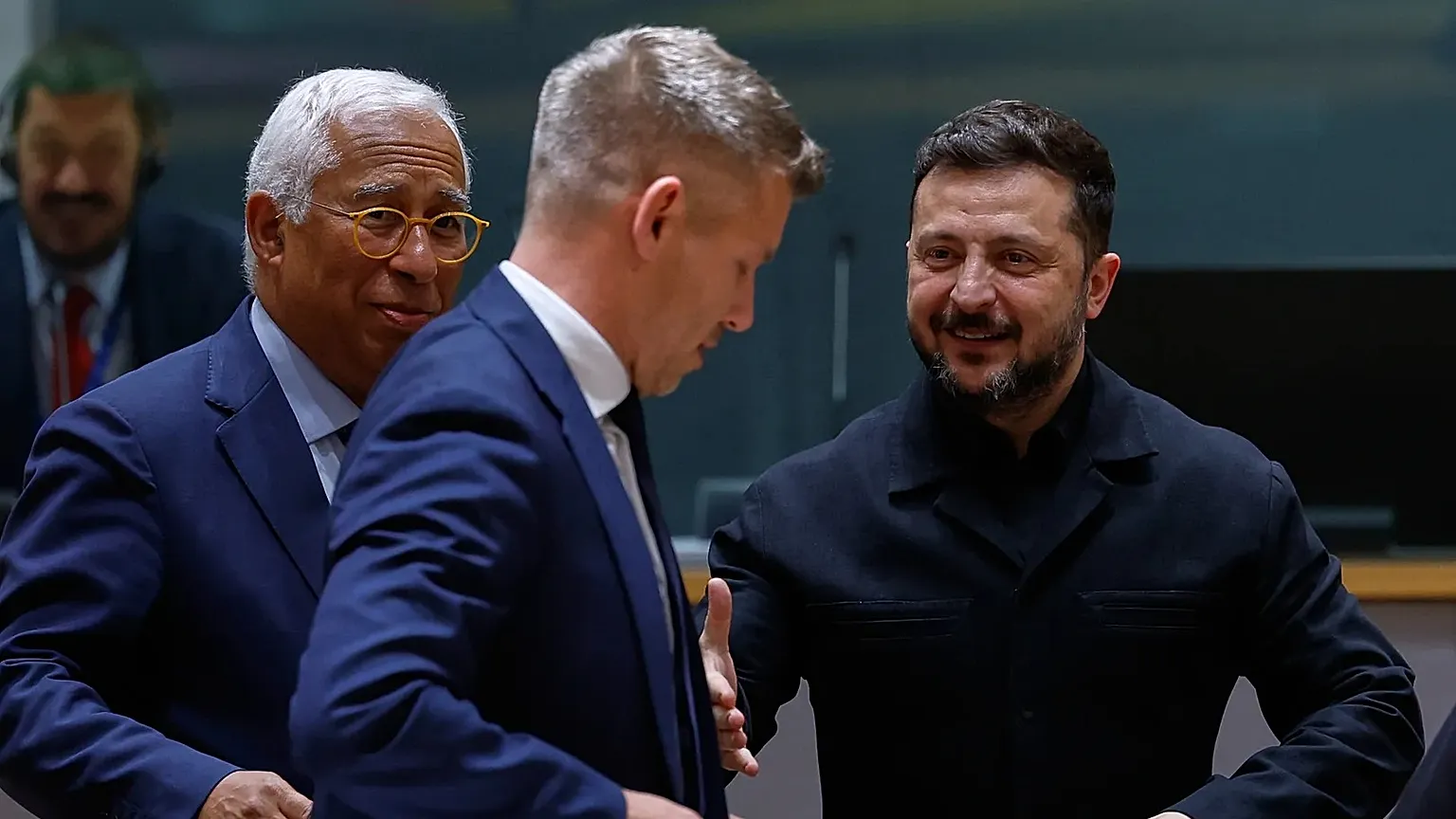 Ukraine's President Volodymyr Zelenskyy, right, greets Hungary's Prime Minister Peter Magyar, center, next to European Council President Antonio Costa during a round table mee