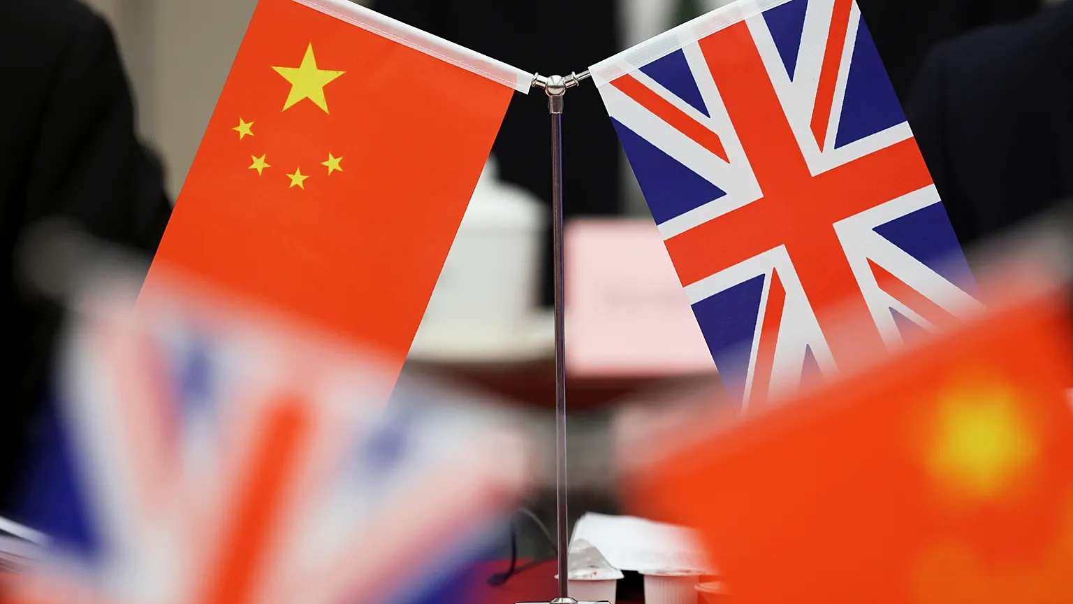 Flags of China and the UK during the China-UK Energy Dialogue in Beijing, 17 March, 2025