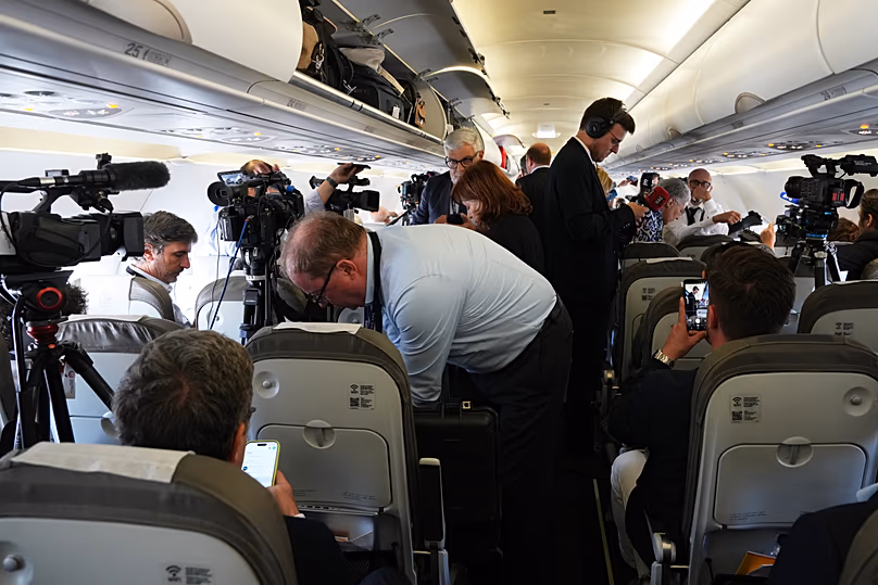 Journalists inside the papal flight after take-off was delayed at Los Rodeos International Airport, 12 June, 2026