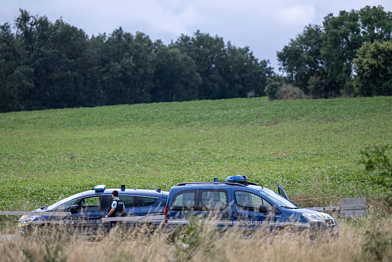 French police block the road at a farm where a body was found during a search to find a missing 11 year-old girl in Puycasquier, 5 June, 2026