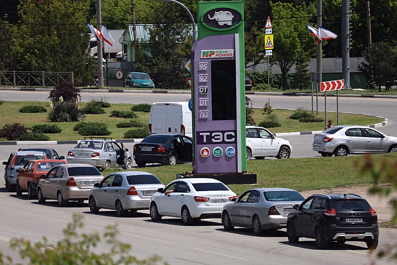 Cars line up at a petrol station in Simferopol, Crimea, Ukraine, Friday, June 12, 2026.